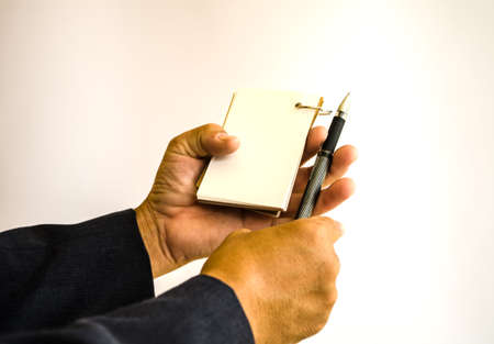businessman making notes on the paperの写真素材