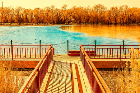 wooden bridge at lake sceneryの写真素材