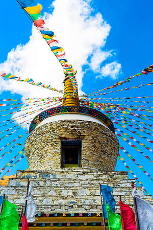 Tibetan prayer flags on a stupaの写真素材
