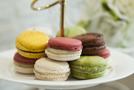A french sweet delicacy, macaroons variety closeup.の写真素材