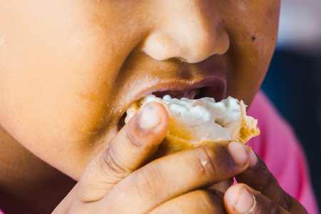 Close-up Boy eating  icecream.の写真素材