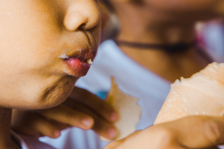 Close-up Boy eating  icecream.の写真素材