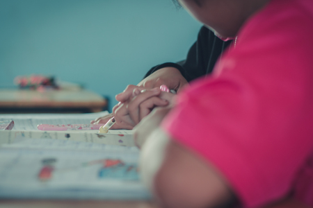 Students are studying in the elementary school classroom.の写真素材