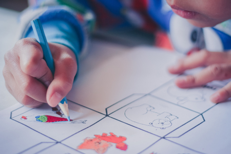 Closeup to Elementary school student are coloring.の写真素材