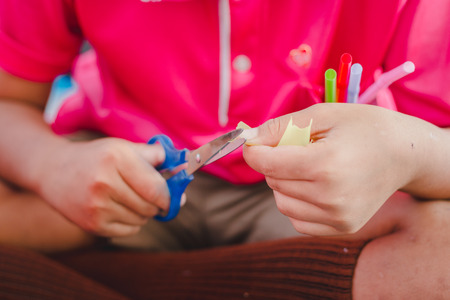 The Students are making straw flowers in classroom.の写真素材