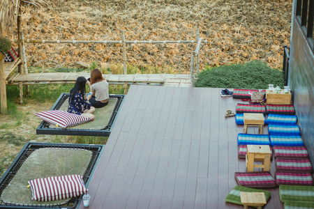 Vocation Woman relaxing and selfie on balcony.の写真素材
