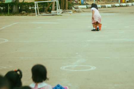 Kindergarten children prepare for exercise in morning.の写真素材