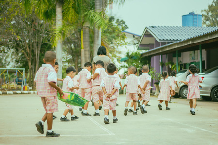 Kindergarten children prepare for exercise in morning.のeditorial素材