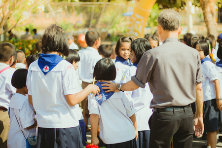 KANCHANABURI THAILAND - FEBRUARY 28 : Teachers and students of Wat Krang Thong School to make merit and candle light on Makha Bucha Day on february 28,2018 at Wat Krang Thong in Kanchanaburi, Thailandのeditorial素材