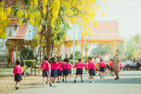 KANCHANABURI THAILAND - FEBRUARY 28 : Teachers and students of Wat Krang Thong School to make merit and candle light on Makha Bucha Day on february 28,2018 at Wat Krang Thong in Kanchanaburi, Thailandのeditorial素材