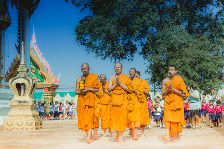 KANCHANABURI THAILAND - FEBRUARY 28 : Teachers and students of Wat Krang Thong School to make merit and candle light on Makha Bucha Day on february 28,2018 at Wat Krang Thong in Kanchanaburi, Thailandのeditorial素材