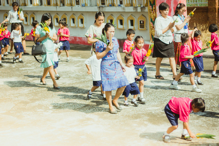 KANCHANABURI THAILAND - FEBRUARY 28 : Teachers and students of Wat Krang Thong School to make merit and candle light on Makha Bucha Day on february 28,2018 at Wat Krang Thong in Kanchanaburi, Thailandのeditorial素材