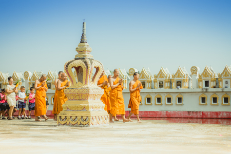 KANCHANABURI THAILAND - FEBRUARY 28 : Teachers and students of Wat Krang Thong School to make merit and candle light on Makha Bucha Day on february 28,2018 at Wat Krang Thong in Kanchanaburi, Thailandのeditorial素材