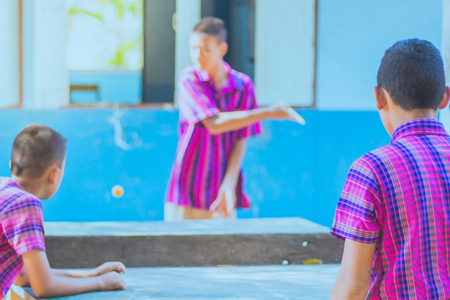 Students are playing table tennisの写真素材