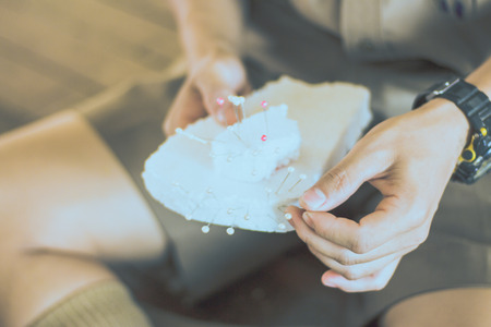 Close-up to Student hands are decorating the curtains.Decorate the stageの写真素材