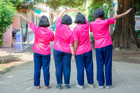 Group of Friends Having Fun on street in secondary school.の写真素材