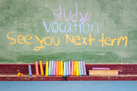 Chalk and board in classroom on the last day of the semester.の写真素材