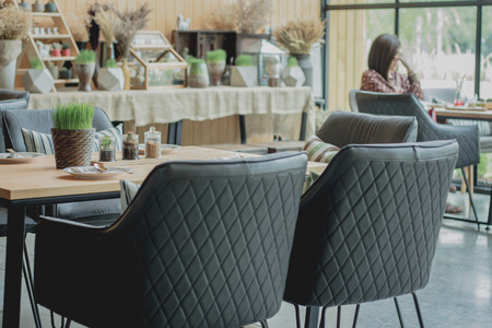 Blur Women sit and wait to negotiate business in the restaurant.の写真素材