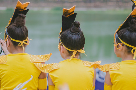 Young actress preparing to perform on stage.の写真素材