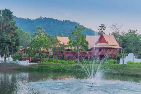 Thai traditional houses style along canal,  Mueang Mallika (historic site) in Kanchanaburi, Thailandの写真素材