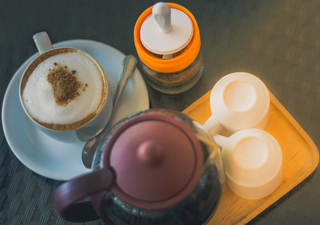 Coffee cup on the table after work.の写真素材