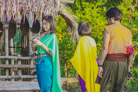 KANCHANABURI,THAILAND-DECEMBER 10 : Unidentified tourists in Thai costumes take photos of themselves  on December 10,2017 at  Mallika City (Mallika City or Muang Mallika is a historic site) in Kanchanaburi, Thailand.のeditorial素材