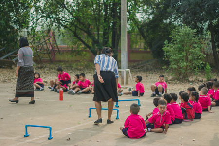 KANCHANABURI THAILAND - FEBRUARY 23 : Unidentified kids exercise in the morning before class on february 23,2018 at Wat Krang Thong School in Kanchanaburi, Thailandのeditorial素材