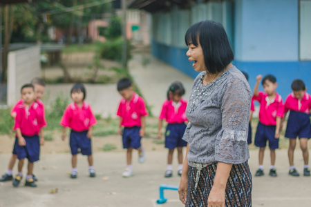 KANCHANABURI THAILAND - FEBRUARY 23 : Unidentified kids exercise in the morning before class on february 23,2018 at Wat Krang Thong School in Kanchanaburi, Thailandのeditorial素材