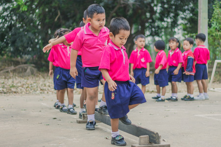 KANCHANABURI THAILAND - FEBRUARY 23 : Unidentified kids exercise in the morning before class on february 23,2018 at Wat Krang Thong School in Kanchanaburi, Thailandのeditorial素材