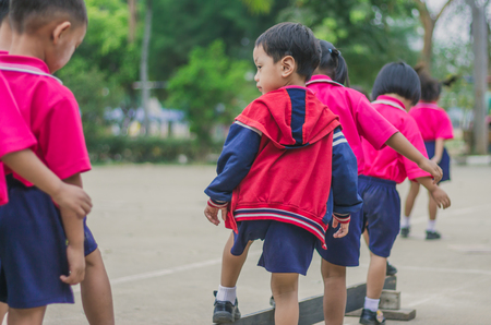 KANCHANABURI THAILAND - FEBRUARY 23 : Unidentified kids exercise in the morning before class on february 23,2018 at Wat Krang Thong School in Kanchanaburi, Thailandのeditorial素材