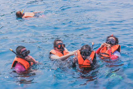 PHANG-NGA THAILAND - APRIL 10 : Unidentified tourists travel around Similan Islands for snorkel by speed boat on April 10,2014 at Similan islands  in Phang-Nga, Thailandのeditorial素材