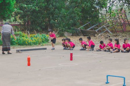 KANCHANABURI THAILAND - FEBRUARY 23 : Unidentified kids exercise in the morning before class on february 23,2018 at Wat Krang Thong School in Kanchanaburi, Thailandのeditorial素材