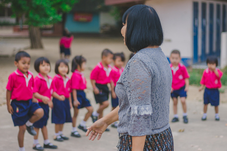 KANCHANABURI THAILAND - FEBRUARY 23 : Unidentified kids exercise in the morning before class on february 23,2018 at Wat Krang Thong School in Kanchanaburi, Thailandのeditorial素材