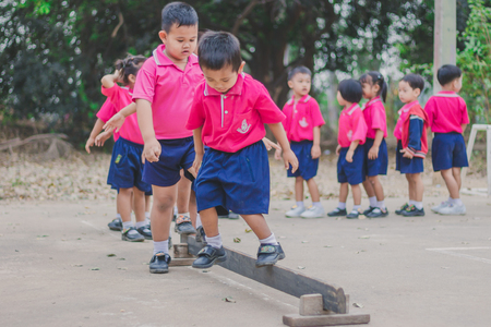 KANCHANABURI THAILAND - FEBRUARY 23 : Unidentified kids exercise in the morning before class on february 23,2018 at Wat Krang Thong School in Kanchanaburi, Thailandのeditorial素材