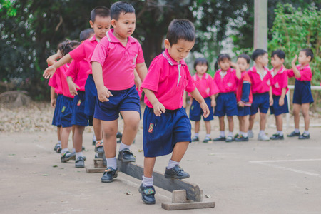 KANCHANABURI THAILAND - FEBRUARY 23 : Unidentified kids exercise in the morning before class on february 23,2018 at Wat Krang Thong School in Kanchanaburi, Thailandのeditorial素材