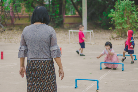 KANCHANABURI THAILAND - FEBRUARY 23 : Unidentified kids exercise in the morning before class on february 23,2018 at Wat Krang Thong School in Kanchanaburi, Thailandのeditorial素材