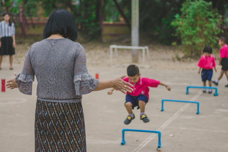 KANCHANABURI THAILAND - FEBRUARY 23 : Unidentified kids exercise in the morning before class on february 23,2018 at Wat Krang Thong School in Kanchanaburi, Thailandのeditorial素材