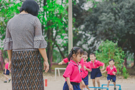 KANCHANABURI THAILAND - FEBRUARY 23 : Unidentified kids exercise in the morning before class on february 23,2018 at Wat Krang Thong School in Kanchanaburi, Thailandのeditorial素材