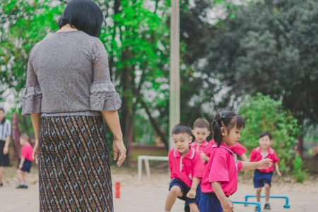KANCHANABURI THAILAND - FEBRUARY 23 : Unidentified kids exercise in the morning before class on february 23,2018 at Wat Krang Thong School in Kanchanaburi, Thailandのeditorial素材