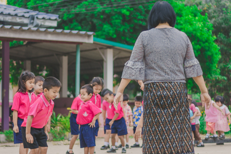 KANCHANABURI THAILAND - FEBRUARY 23 : Unidentified kids exercise in the morning before class on february 23,2018 at Wat Krang Thong School in Kanchanaburi, Thailandのeditorial素材