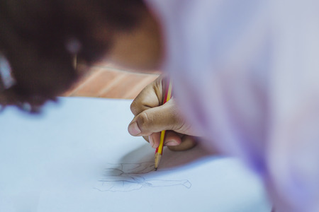 Close up to hands of Student practice drawing a picture.の写真素材