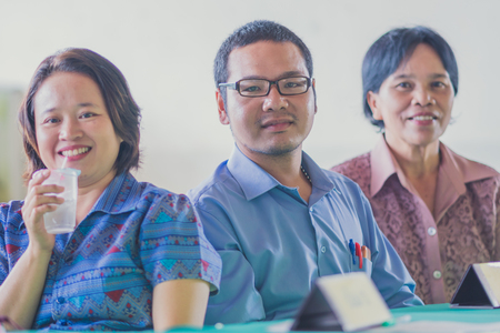 KANCHANABURI THAILAND - JUNE 1 : Unidentified teachers welcome the parents of the students at the annual Parent Meeting on June 1,2018 at Watkrangthongratburana school in Kanchanaburi, Thailandのeditorial素材