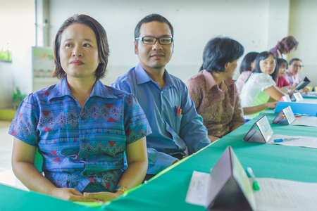 KANCHANABURI THAILAND - JUNE 1 : Unidentified teachers welcome the parents of the students at the annual Parent Meeting on June 1,2018 at Watkrangthongratburana school in Kanchanaburi, Thailandのeditorial素材