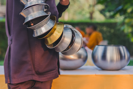 To make merit by offering food to monk ceremony in Thai wedding traditionの写真素材