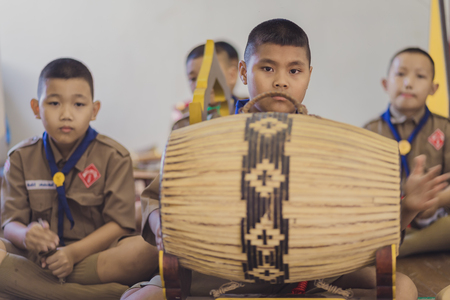 KANCHANABURI THAILAND - JUNE 13 : Unidentified Boy scouts and  Red Cross Youths play Thai music on June 13,2018 at Watkrangthongratburana school in Kanchanaburi, Thailandのeditorial素材
