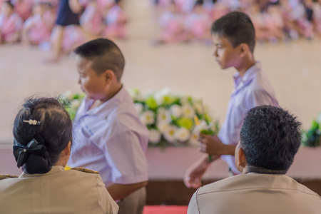 KANCHANABURI THAILAND - JUNE 14 : Unidentified students decorate pedestal tray and flower for give to teachers on Teacher Day on June 14,2018 at Watkrangthongratburana school in Kanchanaburi, Thailandのeditorial素材