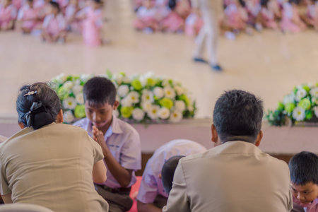 KANCHANABURI THAILAND - JUNE 14 : Unidentified students decorate pedestal tray and flower for give to teachers on Teacher Day on June 14,2018 at Watkrangthongratburana school in Kanchanaburi, Thailandのeditorial素材