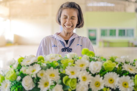 KANCHANABURI THAILAND - JUNE 14 : Unidentified students decorate pedestal tray and flower for give to teachers on Teacher Day on June 14,2018 at Watkrangthongratburana school in Kanchanaburi, Thailandのeditorial素材