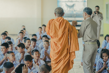 KANCHANABURI THAILAND - JUNE 14 : Unidentified teachers and students make merit to the monks on the Teacher Day on June 14,2018 at Watkrangthongratburana school in Kanchanaburi, Thailandのeditorial素材
