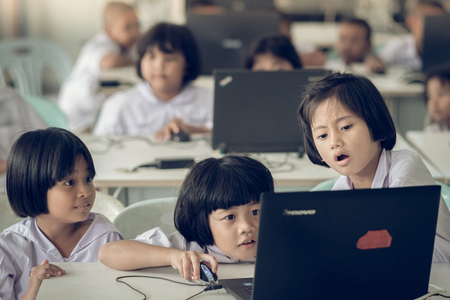 KANCHANABURI THAILAND - JULY 11 : Unidentified Student study by computer in classroom on July 11,2018 at Watkrangthongratburana school in Kanchanaburi, Thailandのeditorial素材